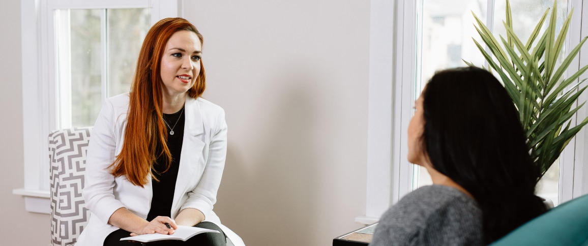 image of woman provider speaking with woman client